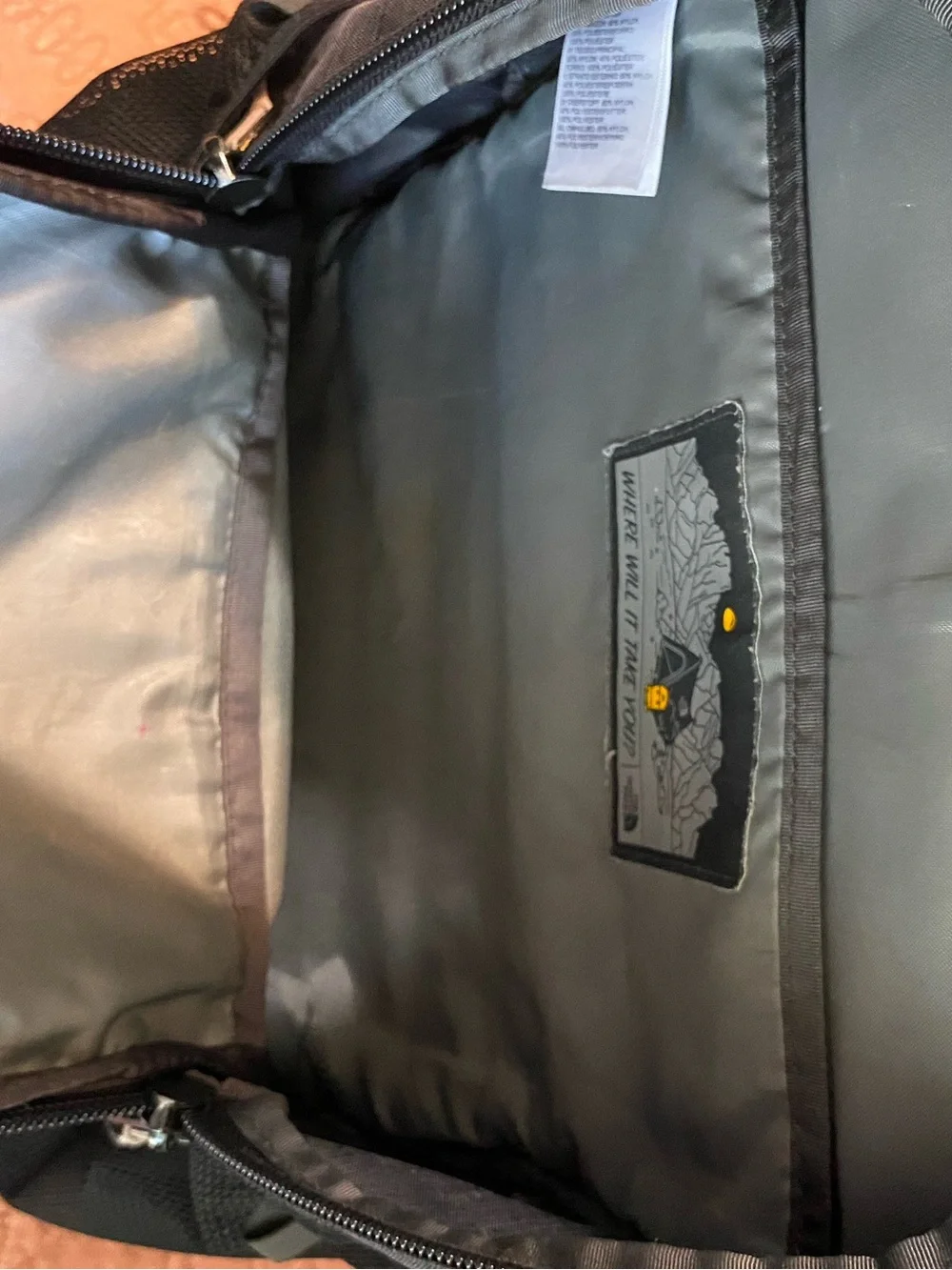 REI brown backpack